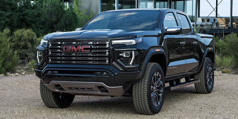 2026 black GMC Canyon with side angle view