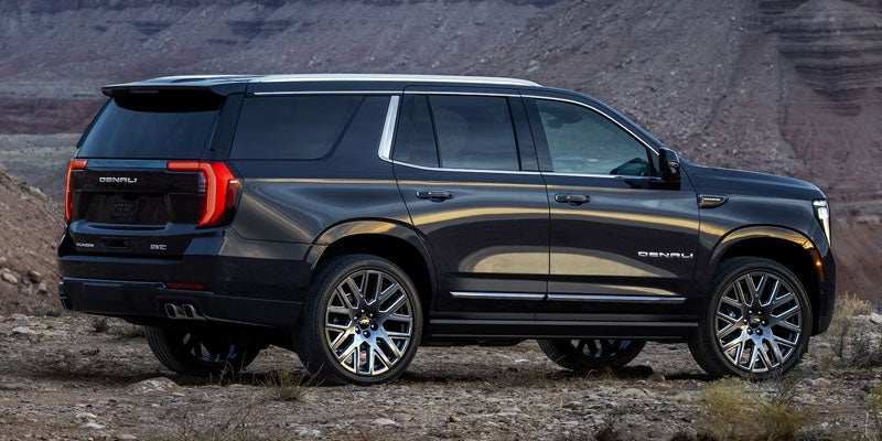 2026 black GMC Yukon with side angle view